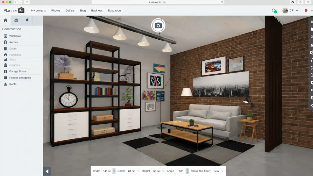 Planner 5D interface showing a modern industrial living room with a brick accent wall, sofa, shelving, artwork, lighting, and coffee table.